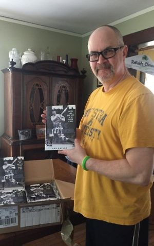 Ron Kaplan with his new book (Facebook)