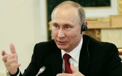 Russian President Vladimir Putin speaks at a meeting with heads of international news agencies at the St. Petersburg International Economic Forum in St. Petersburg, Russia, Thursday, June 1, 2017. (AP Photo/Dmitri Lovetsky, Pool)
