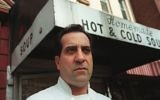 In this 1997 file photo, Al Yeganeh poses for a photograph outside his business, Soup Kitchen International, in New York. Yeganeh was the inspiration for the 'Soup Nazi' character on the US TV comedy 'Seinfeld.' (AP Photo/Michael Schmelling)