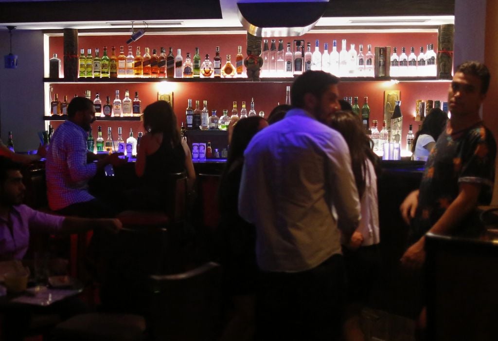 In this May 18, 2017 photo, Syrian sit at a popular bar in the Old City of Damascus, Syria, Thursday, May 18, 2017. (AP Photo/Hassan Ammar) In this May 18, 2017 photo, Syrian sit at a popular bar in the Old City of Damascus, Syria, Thursday, May 18, 2017. (AP Photo/Hassan Ammar)