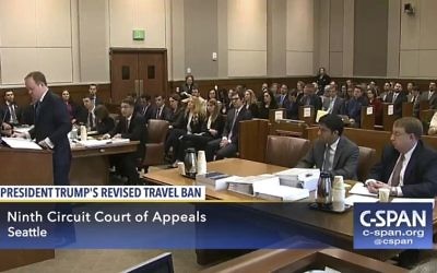Travel Ban Lawsuits_Horo (2) In this May 15, 2017, file image made from a C-SPAN video, Acting Solicitor General Jeffrey Wall, standing at left, presents his arguments during a 9th Circuit Court of Appeals panel in Seattle, Monday, May 15, 2017. (CSPAN via AP, Pool, file)