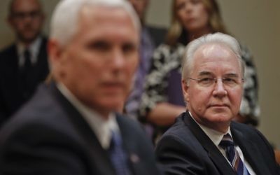 Health and Human Services Secretary Tom Price, right, listens to Vice President Mike Pence, left, speak during a meeting on healthcare reform in the Roosevelt Room of the White House in Washington, Monday, June 5, 2017. (AP Photo/Pablo Martinez Monsivais)