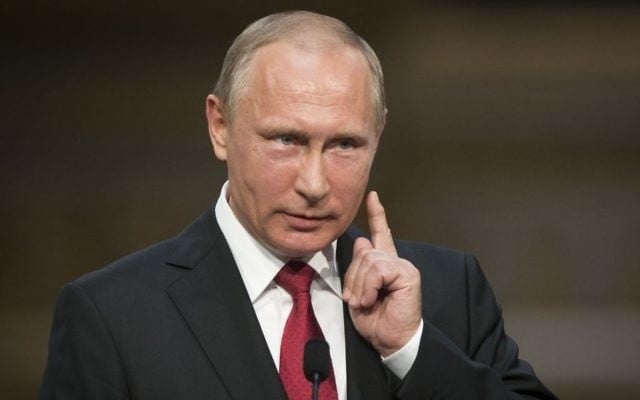 Russian President Vladimir Putin gestures as he speaks during a news conference at the Palace of Versailles, near Paris, May 29, 2017. (AP/Alexander Zemlianichenko) 