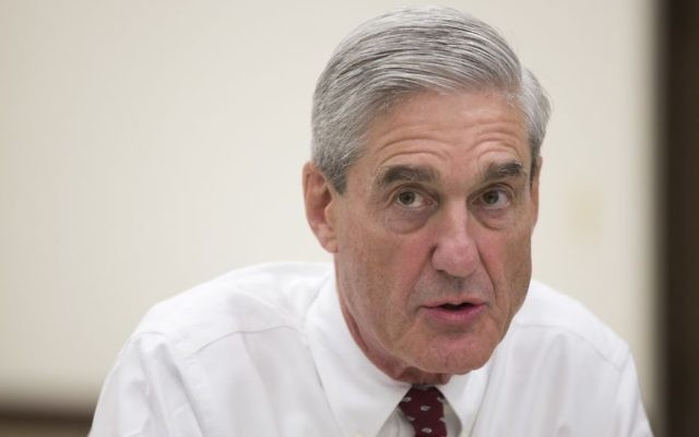 In this August 21, 2013 file photo, former FBI director Robert Mueller speaks during an interview at FBI headquarters in Washington DC. (AP Photo/Evan Vucci, File) In this August 21, 2013 file photo, former FBI director Robert Mueller speaks during an interview at FBI headquarters in Washington DC. (AP Photo/Evan Vucci, File)