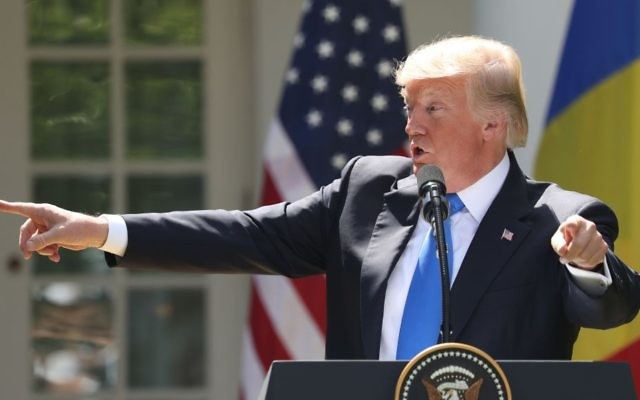 President Donald Trump, accompanied by Romanian President Klaus Werner Iohannis, speaks during a news conference in the Rose Garden at the White House, Friday, June 9, 2017, in Washington. (Andrew Harnik/AP) President Donald Trump, accompanied by Romanian President Klaus Werner Iohannis, speaks during a news conference in the Rose Garden at the White House, Friday, June 9, 2017, in Washington. (Andrew Harnik/AP)