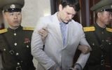 In this March 16, 2016, file photo, American student Otto Warmbier is escorted at the Supreme Court in Pyongyang, North Korea. Warmbier, whose parents say has been in a coma while serving a 15-year prison term in North Korea, was released and returned to the United States Tuesday, June 13, 2017, as the Trump administration revealed a rare exchange with the reclusive country. (AP Photo/Jon Chol Jin, File)