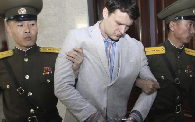 In this March 16, 2016, file photo, American student Otto Warmbier is escorted at the Supreme Court in Pyongyang, North Korea. Warmbier, whose parents say has been in a coma while serving a 15-year prison term in North Korea, was released and returned to the United States Tuesday, June 13, 2017, as the Trump administration revealed a rare exchange with the reclusive country. (AP Photo/Jon Chol Jin, File) In this March 16, 2016, file photo, American student Otto Warmbier is escorted at the Supreme Court in Pyongyang, North Korea. Warmbier, whose parents say has been in a coma while serving a 15-year prison term in North Korea, was released and returned to the United States Tuesday, June 13, 2017, as the Trump administration revealed a rare exchange with the reclusive country. (AP Photo/Jon Chol Jin, File)