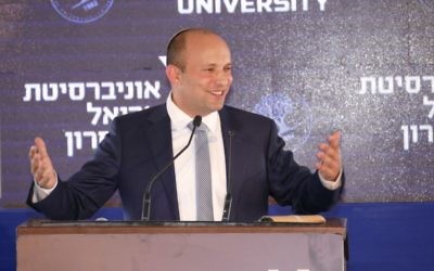 Education Minister Naftali Bennett speaks at the cornerstone setting for The University of Ariel's new medical school, June 28, 2017. (Michael Dimenson)