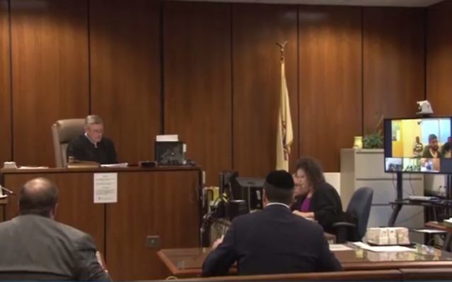 Six Lakewood residents accused of benefits fraud appear in Ocean County Superior Court via video conference, June 28, 2017. (Screen capture: Asbury Park Press video) Six Lakewood residents accused of benefits fraud appear in Ocean County Superior Court via video conference, June 28, 2017. (Screen capture: Asbury Park Press video)