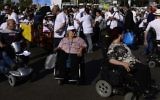 Illustrative: Disabled and able-bodied activists attend a protest in Tel Aviv, June 13, 2017. (Tomer Neuberg/Flash90)