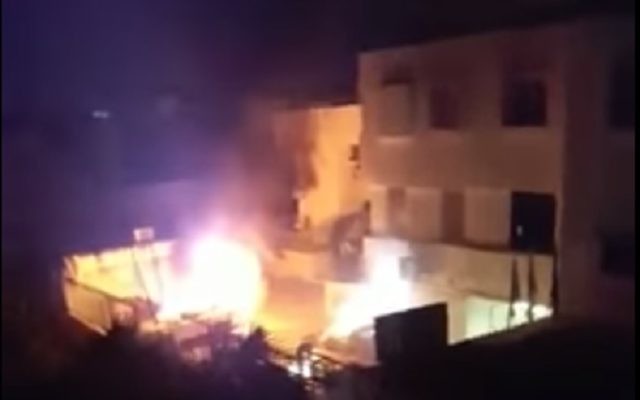 Police cars set on fire in Kafr Kassem on June 6, 2017. (screen capture: YouTube) Police cars set on fire in Kafr Kassem on June 6, 2017. (screen capture: YouTube)