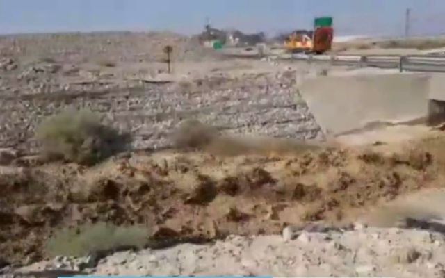 The muddy Ashalim stream flowing on Friday, June 30 2017 after acidic water leaked from a fertilizer plant nearby. (Screen capture Channel 2)