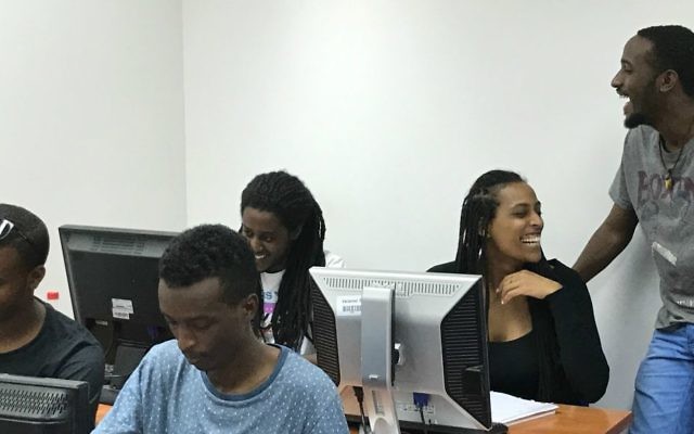 Teasing and joking with each other during Tech-Career's classes (Shoshanna Solomon/TimesofIsrael)