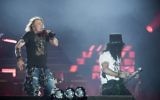 Axl Rose (L), lead singer of the rock band Guns N' Roses, performs with Slash at Parken Stadium, Copenhagen, Denmark, on June 27, 2017. (AFP/Mads Joakim Rimer Rasmussen)
