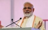 Indian Prime Minister Narendra Modi gives a speech during an event marking the 100th anniversary of Sabarmati Ashram and  the 150th birth anniversary of poet and philosopher Shrimad Rajchandraji,  in Ahmedabad on June 29, 2017. (AFP PHOTO / SAM PANTHAKY)