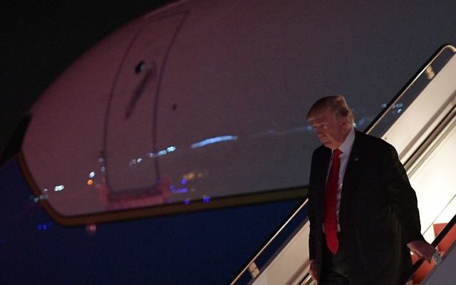 US President Donald Trump steps off Air Force One upon arrival at Morristown Municipal Airport in Morristown, New Jersey on July 1, 2017. (AFP/MANDEL NGAN)