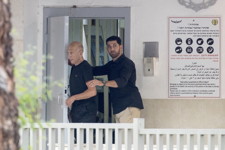 Former prime minister Ehud Olmert leaves Ramle's Ma’asiyahu prison on July 2, 2017, following his release. (AFP Photo/Jack Guez) Former prime minister Ehud Olmert leaves Ramle's Ma’asiyahu prison on July 2, 2017, following his release. (AFP Photo/Jack Guez)
