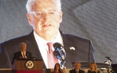 US Ambassador to Israel David Friedman, left, speaks on stage during a Fourth of July Independence Day celebration at the residence of the US Ambassador to Israel in Herzilya Pituah on July 3, 2017. (AFP / Heidi Levine)