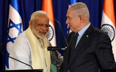 Indian Prime Minister Narendra Modi (L) and Israeli Prime Minister Benjamin Netanyahu shake hands following a statement on July 4, 2017, in Jerusalem. (AFP PHOTO / POOL AND AFP PHOTO / DEBBIE HILL)