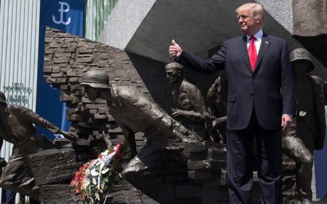 US President Donald Trump holds his thumb up as he stands in front of the Warsaw Uprising Monument on Krasinski Square during the Three Seas Initiative Summit in Warsaw, Poland, July 6, 2017. (AFP/Saul Loeb) US President Donald Trump holds his thumb up as he stands in front of the Warsaw Uprising Monument on Krasinski Square during the Three Seas Initiative Summit in Warsaw, Poland, July 6, 2017. (AFP/Saul Loeb)