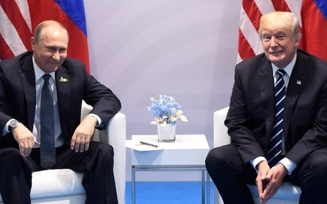 US President Donald Trump and Russia's President Vladimir Putin hold a meeting on the sidelines of the G20 Summit in Hamburg, Germany, on July 7, 2017. (AFP / SAUL LOEB) US President Donald Trump and Russia's President Vladimir Putin hold a meeting on the sidelines of the G20 Summit in Hamburg, Germany, on July 7, 2017. (AFP / SAUL LOEB)