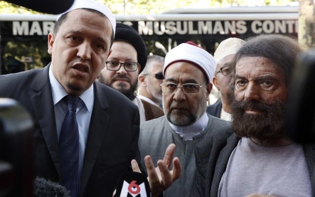 The Imam Hassen Chalghoumi (L), writer Marek Halter (R) and others prepare to take part in The Muslim March Against Terrorism in Paris on July 8, 2017. (AFP PHOTO / FRANCOIS GUILLOT) The Imam Hassen Chalghoumi (L), writer Marek Halter (R) and others prepare to take part in The Muslim March Against Terrorism in Paris on July 8, 2017. (AFP PHOTO / FRANCOIS GUILLOT)