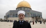 Jerusalem's Mufti Mohammed Hussein posing in front of the Dome of the Rock at the Temple Mount in Jerusalem's Old City. (Ahmad Gharabli/AFP)