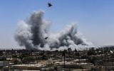 Illustrative: Smoke billows following an airstrike on the western frontline of Raqqa, Syria, July 15, 2017. (AFP/Bulent Kilic)