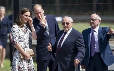 Britain's Prince William, Duke of Cambridge (2nd L), and his wife Kate, the Duchess of Cambridge (L), visit the former Stutthof Nazi concentration camp near Gdansk, Poland, on July 18, 2017. (AFP Photo/Simon Krawczyk)