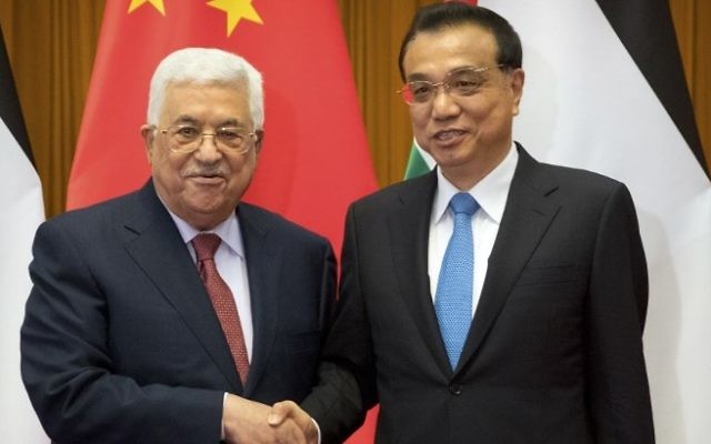 Palestinian Authority President Mahmoud Abbas (L) shakes hands with Chinese President Xi Jinping during a signing ceremony at the Great Hall of the People in Beijing on July 18, 2017. (AFP Photo/Pool/Mark Schiefelbein) Palestinian Authority President Mahmoud Abbas (L) shakes hands with Chinese President Xi Jinping during a signing ceremony at the Great Hall of the People in Beijing on July 18, 2017. (AFP Photo/Pool/Mark Schiefelbein)
