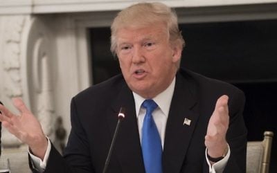 US President Donald Trump speaks during a meeting with Republican senators at the White House on July 19, 2017. (AFP Photo/Saul Loeb)