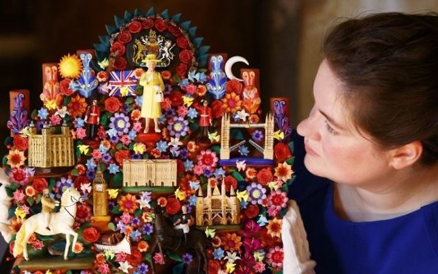 A "Tree of Life" art piece presented to Britain's Queen Elizabeth II by the Mexican president during a state visit in March 2015 is pictured, at Buckingham Palace in London on July 20, 2017 as part of the forthcoming 'Royal Gifts' exhibition. (Tolga Akmen/AFP) A "Tree of Life" art piece presented to Britain's Queen Elizabeth II by the Mexican president during a state visit in March 2015 is pictured, at Buckingham Palace in London on July 20, 2017 as part of the forthcoming 'Royal Gifts' exhibition. (Tolga Akmen/AFP)