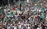 Jordanians carry a model of the Dome of the Rock mosque during a demonstration in Amman against new Israeli security measures at the Temple Mount on July 21, 2017. (AFP Photo/Khalil Mazraawi)