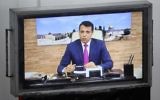 Exiled former senior Fatah member Mohammed Dahlan attends a Palestinian Legislative Council meeting in Gaza City through video conference from the United Arab Emirates on July 27, 2017. (AFP PHOTO / SAID KHATIB)