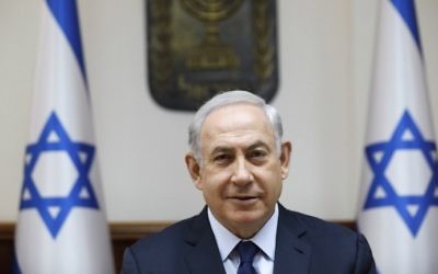 Prime Minister Benjamin Netanyahu leads the weekly cabinet meeting at his office in Jerusalem, July 30, 2017. (AFP/ AMIR COHEN)
