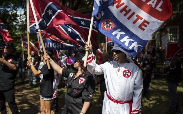 The Ku Klux Klan protests on July 8, 2017, in Charlottesville, Virginia. (Chet Strange/Getty Images/AFP) The Ku Klux Klan protests on July 8, 2017, in Charlottesville, Virginia. (Chet Strange/Getty Images/AFP)