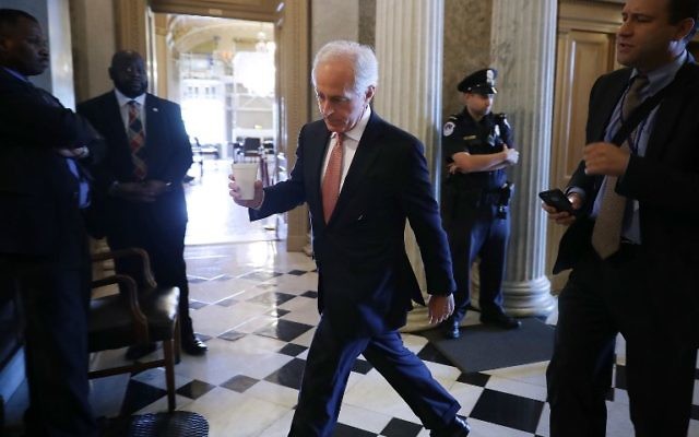 Senator Bob Corker (R-Tennessee) heads into the Senate Chamber at the US Capitol, in Washington DC, July 26, 2017. (Chip Somodevilla/Getty Images/AFP)