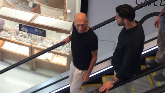 Former prime minister Ehud Olmert is seen shopping at TLV Fashion Mall in Tel Aviv on July 2, 2017, hours after being paroled from Matisyahu Prison. (courtesy) Former prime minister Ehud Olmert is seen shopping at TLV Fashion Mall in Tel Aviv on July 2, 2017, hours after being paroled from Matisyahu Prison. (courtesy)