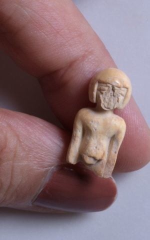 Ivory statue in the image of a woman found in the City of David, 2017. (Clara Amit, Israel Antiquities Authority) 