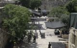 Israeli border police officers stand guard near newly installed cameras at the entrance to the Temple Mount in Jerusalem's Old City, July 23, 2017. (AP Photo/Mahmoud Illean)