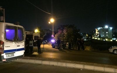 Jordanian security forces parked near the approach toward the Israeli embassy in Amman, Jordan, on Sunday, June 23, 2017. (AP Photo/Omar Akour)