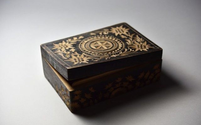 This photo made available by the Aushwitz Museum on Wednesday, July 26, 2017 shows a wooden box made by Polish Auschwitz inmate Brinoslaw Czech. (Pawel Sawicki/Aushwitz Museum via AP) This photo made available by the Aushwitz Museum on Wednesday, July 26, 2017 shows a wooden box made by Polish Auschwitz inmate Brinoslaw Czech. (Pawel Sawicki/Aushwitz Museum via AP)