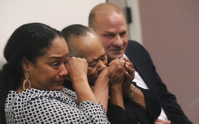 O.J. Simpson's sister Shirley Baker, center, daughter Arielle Simpson, left, and friend Tom Scotto react after Simpson was granted parole at Lovelock Correctional Center in Lovelock, Nevada, July 20, 2017. (Jason Bean/The Reno Gazette-Journal via AP) O.J. Simpson's sister Shirley Baker, center, daughter Arielle Simpson, left, and friend Tom Scotto react after Simpson was granted parole at Lovelock Correctional Center in Lovelock, Nevada, July 20, 2017. (Jason Bean/The Reno Gazette-Journal via AP)