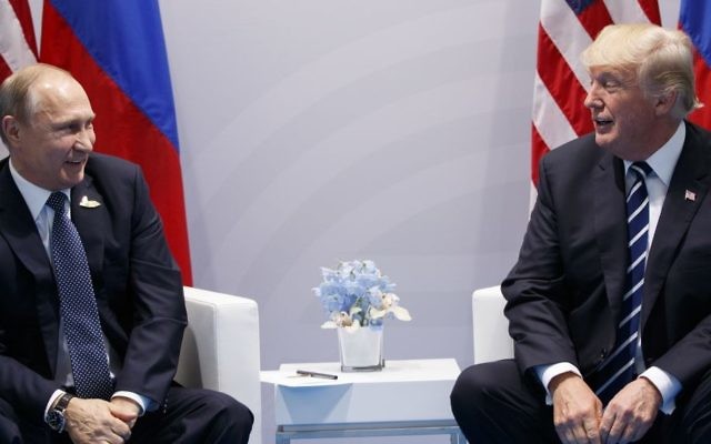 US President Donald Trump meets with Russian President Vladimir Putin at the G20 Summit, Friday, July 7, 2017, in Hamburg. (AP/Evan Vucci) US President Donald Trump meets with Russian President Vladimir Putin at the G20 Summit, Friday, July 7, 2017, in Hamburg. (AP/Evan Vucci)
