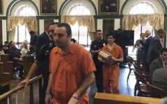 Anthony Graziano and Aakash Dalal are led from the courtroom after their sentencing, Friday, July 28, 2017 in Hackensack, NJ. Graziano and Dalal have been sentenced to 35 years in prison for terrorizing a group of Jewish communities in New Jersey. Prosecutors say they firebombed two synagogues, threw a Molotov cocktail into the home of a rabbi and also spray painted anti-Semitic graffiti at two other synagogues. (Allison Pries/The Record via AP, Pool)