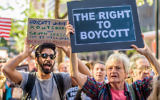 Illustrative image of demonstrators outside the offices of New York Gov. Andrew Cuomo protesting his executive order calling for New York companies to divest from organizations that support the BDS movement, June 9, 2016. (Erik McGregor/Pacific Press/LightRocket/Getty Images via JTA)