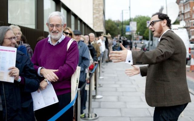 Chief executive Raymond Simonson greeting visitors at the opening of London’s JW3 community center in 2013. (Blake Ezra Photography via JTA) Chief executive Raymond Simonson greeting visitors at the opening of London’s JW3 community center in 2013. (Blake Ezra Photography via JTA)