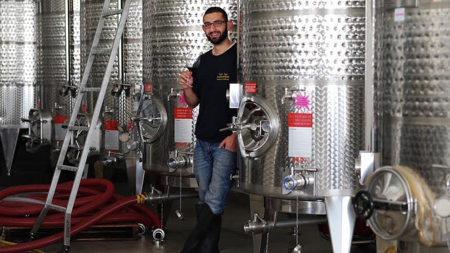 Canaan Khoury posing in a promotional photo at his Taybeh Winery in the West Bank. (Courtesy of Taybeh Winery via JTA) Canaan Khoury posing in a promotional photo at his Taybeh Winery in the West Bank. (Courtesy of Taybeh Winery via JTA)