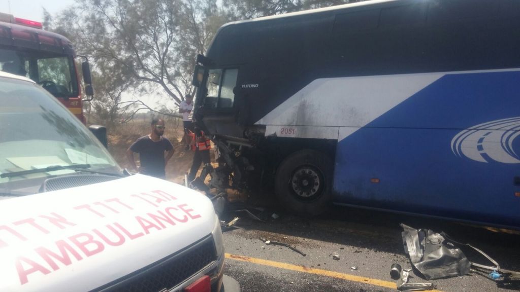 Medics respond to an accident involving a car and a bus, in which an IDF officer was killed, in southern Israel on July 17, 2017. (Magen David Adom) Medics respond to an accident involving a car and a bus, in which an IDF officer was killed, in southern Israel on July 17, 2017. (Magen David Adom)