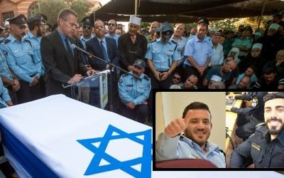 Israeli Minister of Public Security Gilad Erdan speaks at the funeral of Israeli Druze police officer Kamil Shnaan in the northern village of Hurfeish, July 14, 2017. (Basel Awidat/Flash90). Inset: Master Sgt. Shnaan, left, and Master Sgt. Haeil Sitawe, right, the police officers killed in the terror attack next to the Temple Mount complex in Jerusalem on July 14, 2017. (Israel Police)